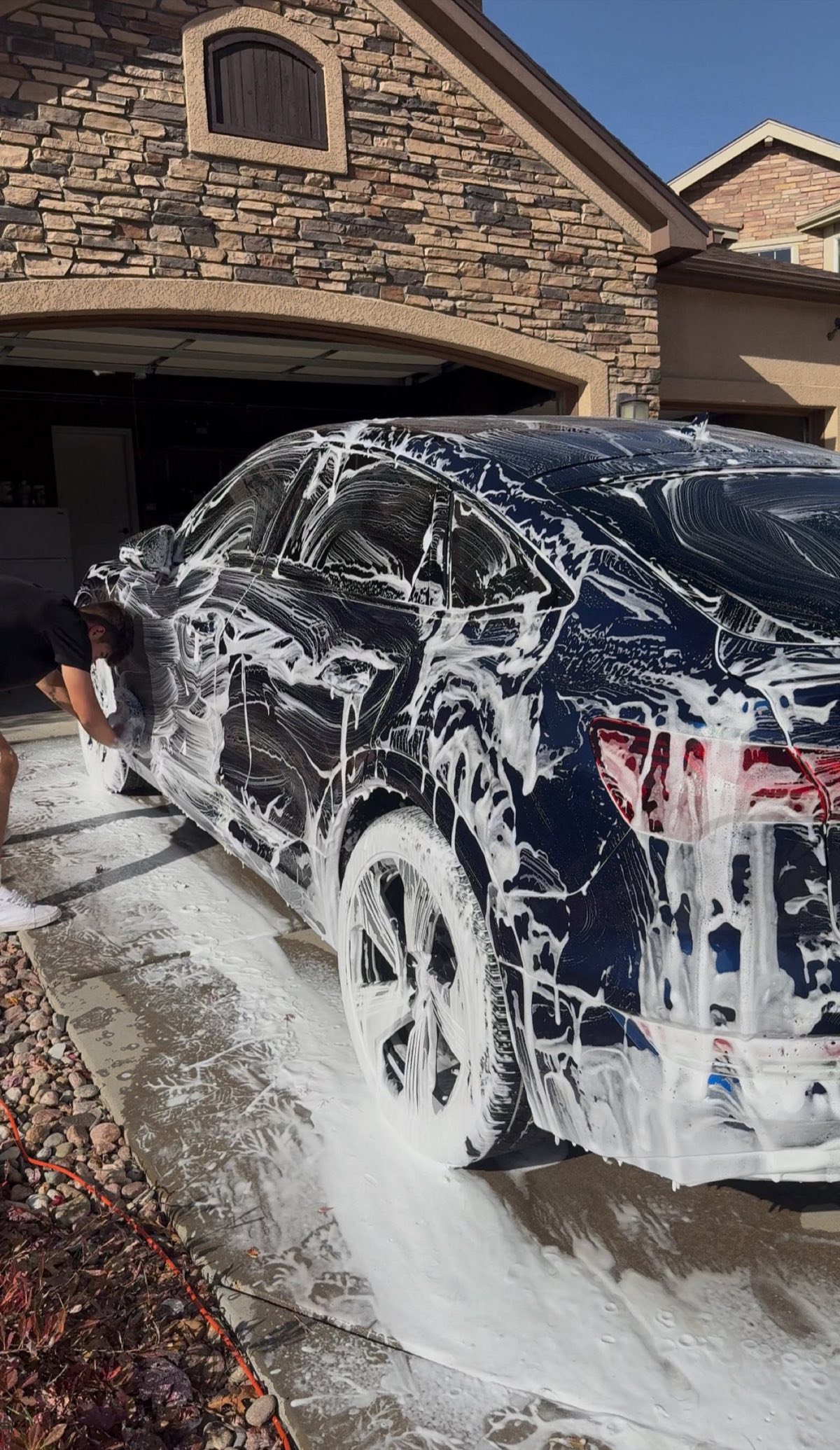 Foam wash on SUV in driveway — Professional Car Detailing Colorado Springs (Digii Mobile Detailing)