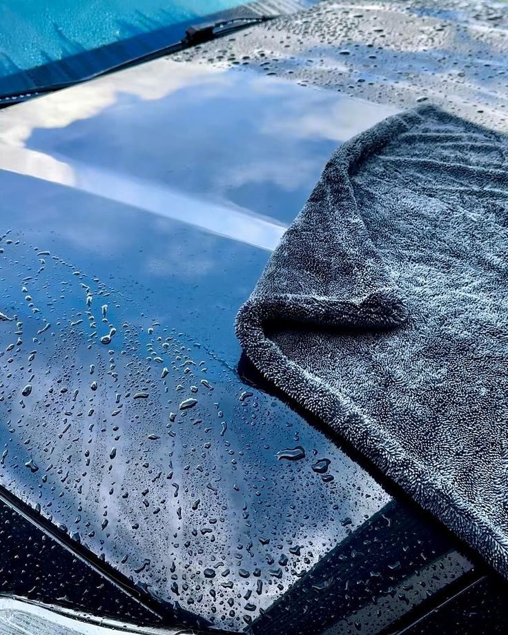 Water beading on ceramic-coated paint — hydrophobic self-cleaning finish